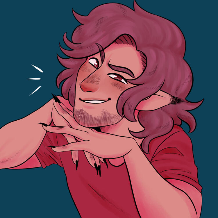 A man with pointed, fuzzy ears leaning on his hands with a cheeky smile.